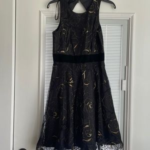 Eliza J dress with golden rose design and velvet sash